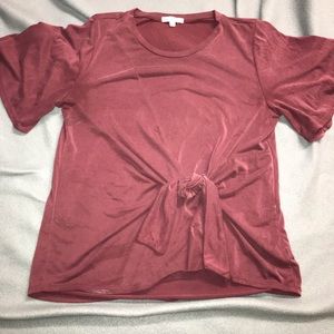 Looking burgundy shirt really thin has a bow